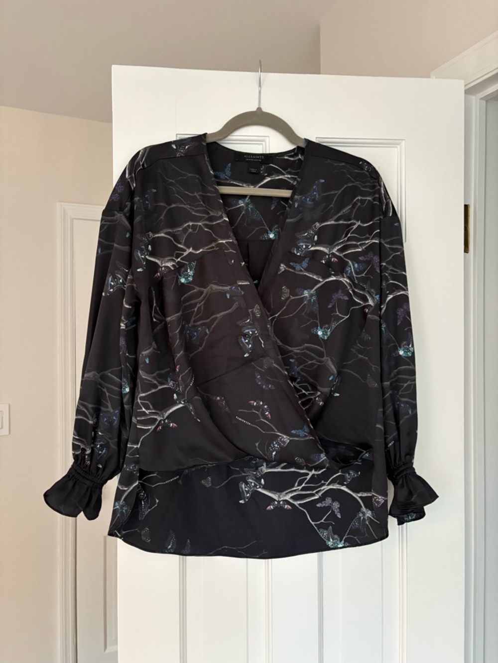 AllSaints Black Floral Wrap Blouse with Teal Accents